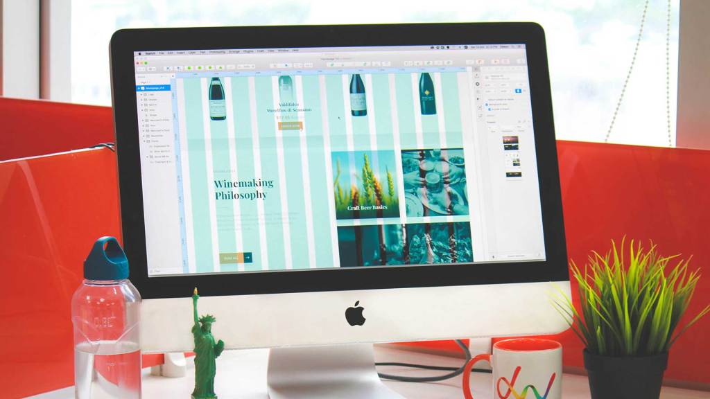 Desktop computer screen showing a web design featuring a grid